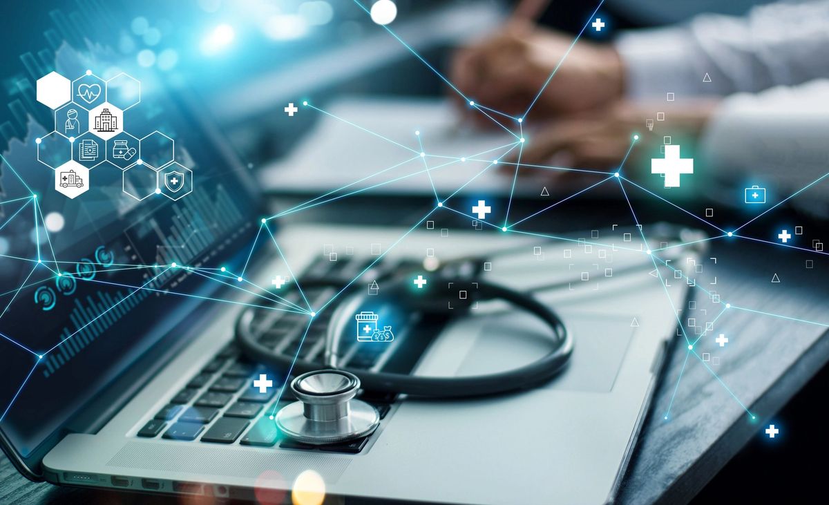 Stethoscope on laptop with healthcare network icons