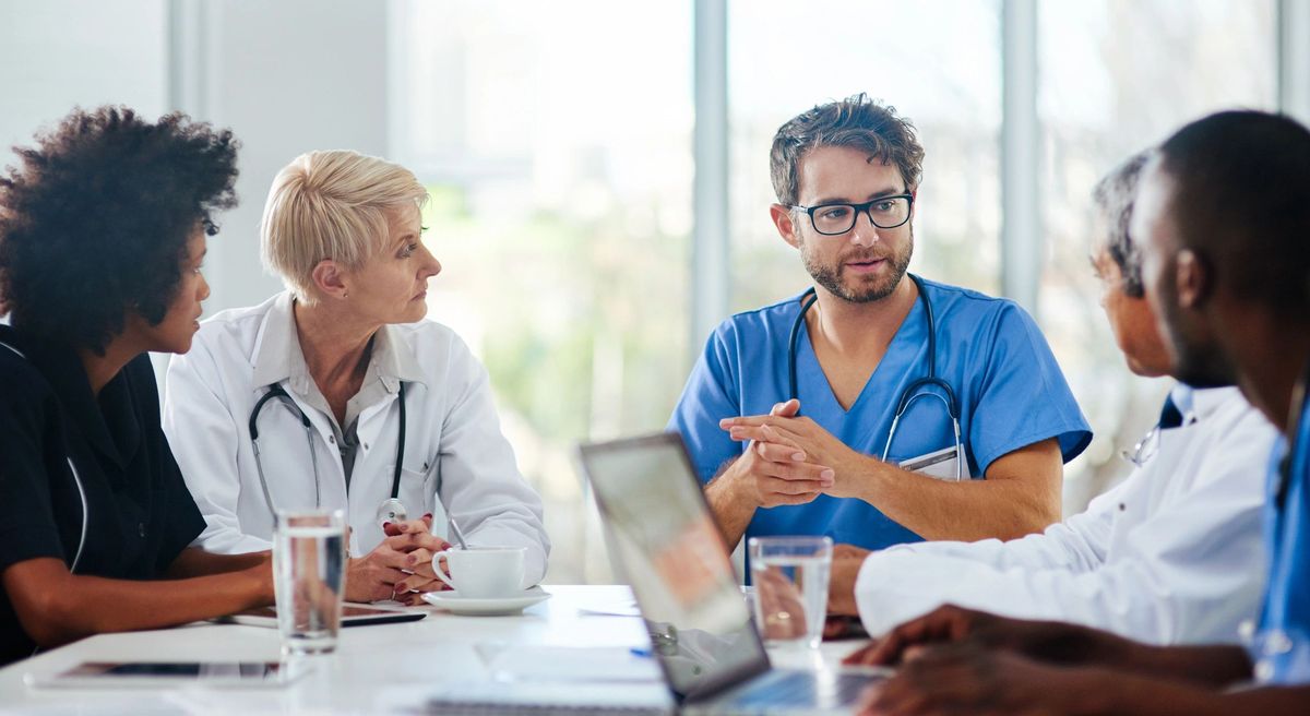 Multidisciplinary medical team in discussion